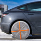 AutoSock HP for passenger cars mounted on rear wheels of a car on snow