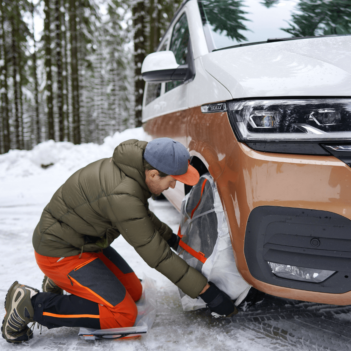 Installation of AutoSock HP for cars on front wheels of a van on snow and ice